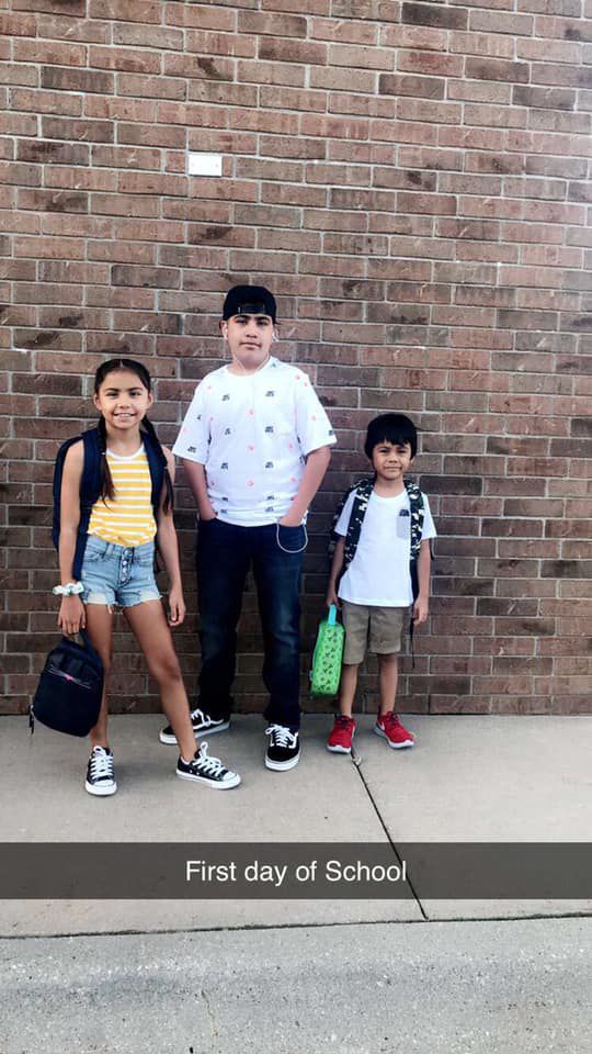 Nahzoni 4th grade, Kayden 9th grade, Dominick 1st grade